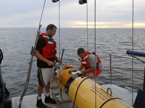 RADIO AI's hans
thomas with undersea robot onboard vessel at sea